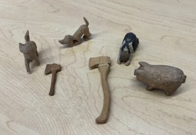 whittled wood figures
