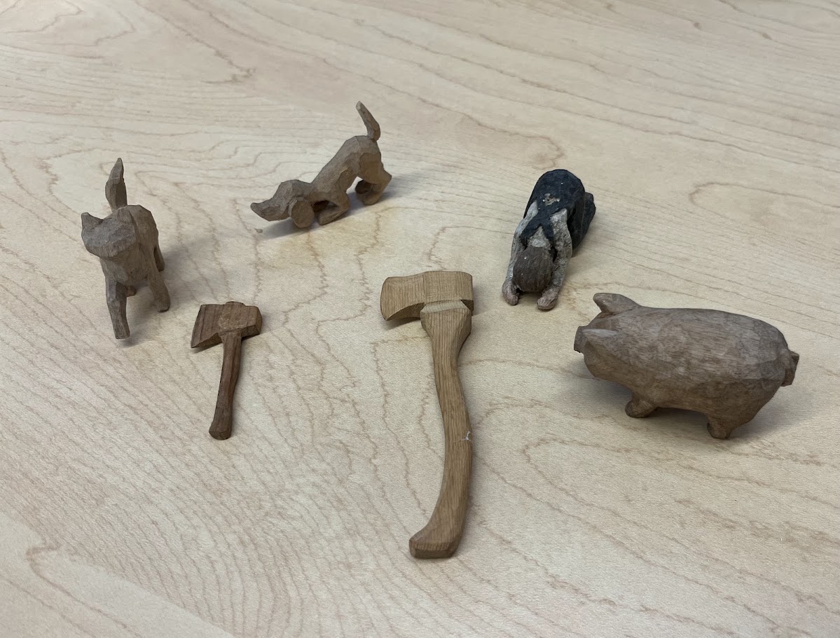 whittled wood figures